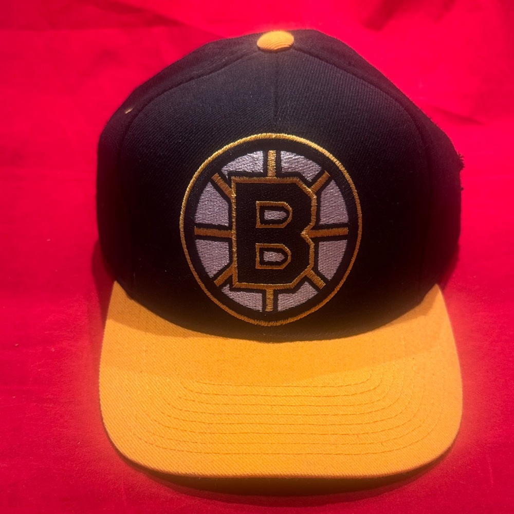 NHL Black and Gold Cap with Emblem